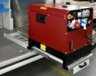 Slitta aperta con pesante generatore